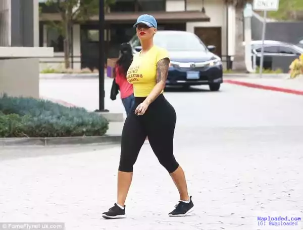 Photos: Amber Rose Shows Off Amazing Curves In Leggins And A Slogan T-Shirt